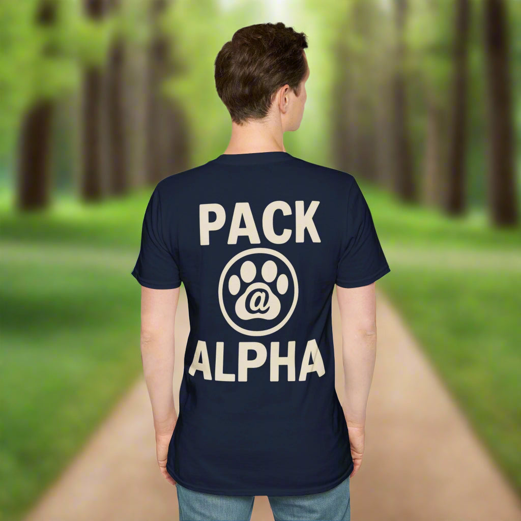 Front of navy blue t-shirt with subtle off-white chest logo showing “PACK ALPHA” curved above a paw print with an @ symbol in the center
