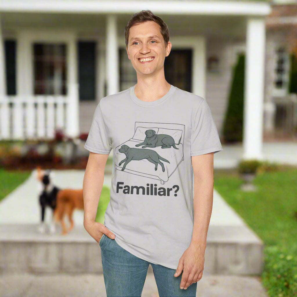 Man wearing gray t-shirt with greenish dog graphic and the word “Familiar?” underneath