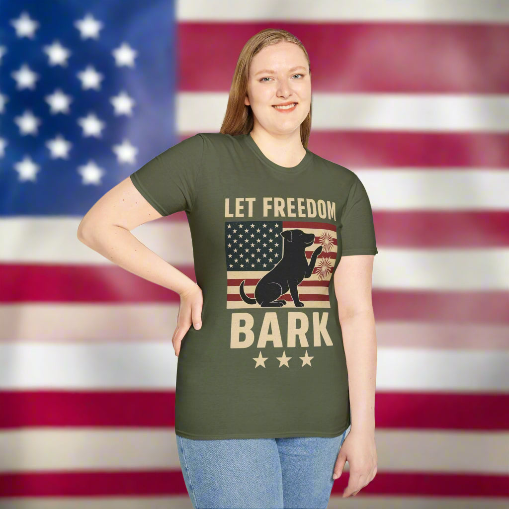 Woman wearing green Let Freedom Bark t-shirt with vintage tan print, celebrating dog rescue and patriotic pride for the 4th of July.