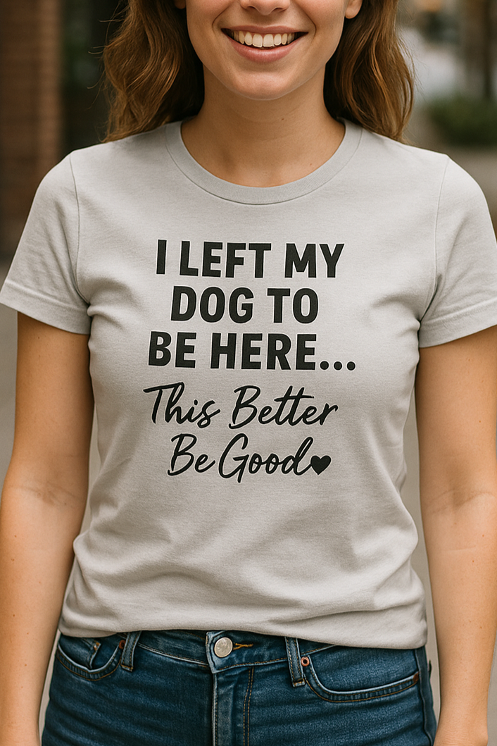 Woman wearing a t-shirt with text standing outdoors.