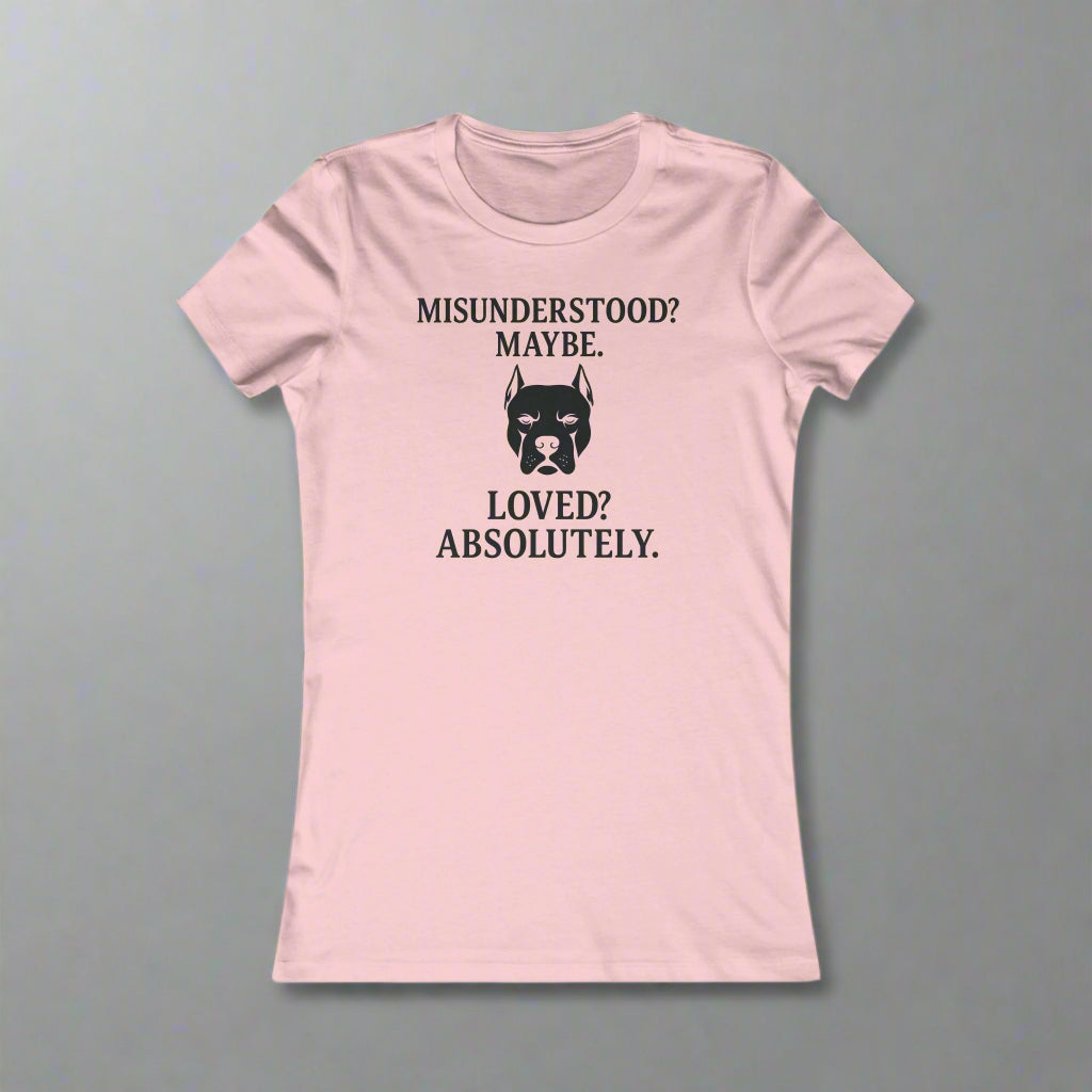 Pink t-shirt with black text and dog graphic on a white background