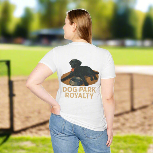 woman wearing a white unisex t-shirt with a bold back graphic of a black Labrador lying next to a silver water bowl, above the words "Dog Park Royalty"

