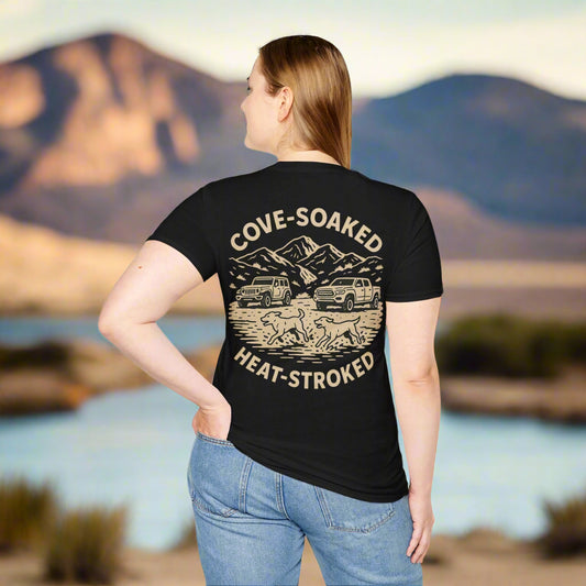 Back print t-shirt design with dogs, 4x4 trucks, mountains, and “Cove-Soaked Heat-Stroked” slogan in vintage cream ink