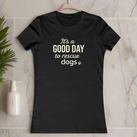 Bold dog rescue slogan t-shirt reading “It’s a Good Day to Rescue Dogs” in stacked mixed fonts on a black shirt

