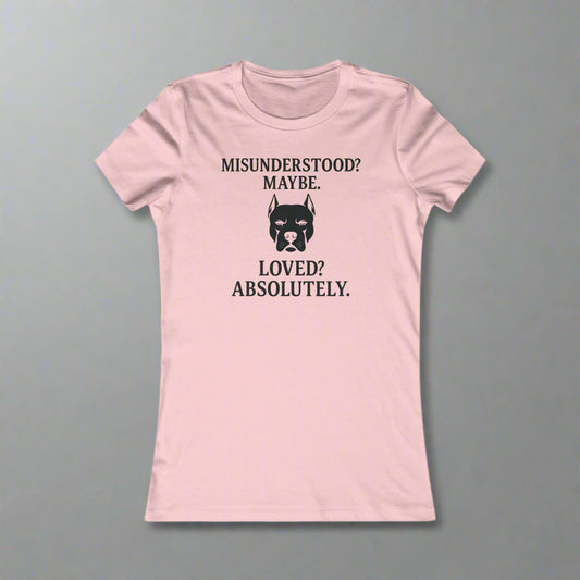Pink t-shirt with black text and dog graphic on a white background