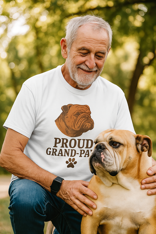 White t-shirt with a vintage-style English Bulldog head illustration above the text "Proud Grand-Paw" and a paw print, displayed in a flat front-facing mockup.
