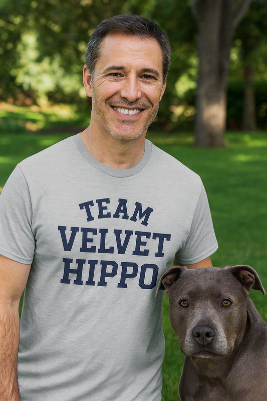 Bold varsity-style “Team Velvet Hippo” text design on a unisex t-shirt, inspired by classic collegiate athletic fonts. Perfect for Pit Bull lovers and rescue dog advocates.